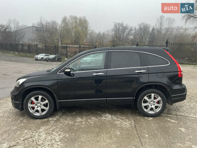 Черный Хонда СРВ, объемом двигателя 2.2 л и пробегом 288 тыс. км за 9700 $, фото 2 на Automoto.ua