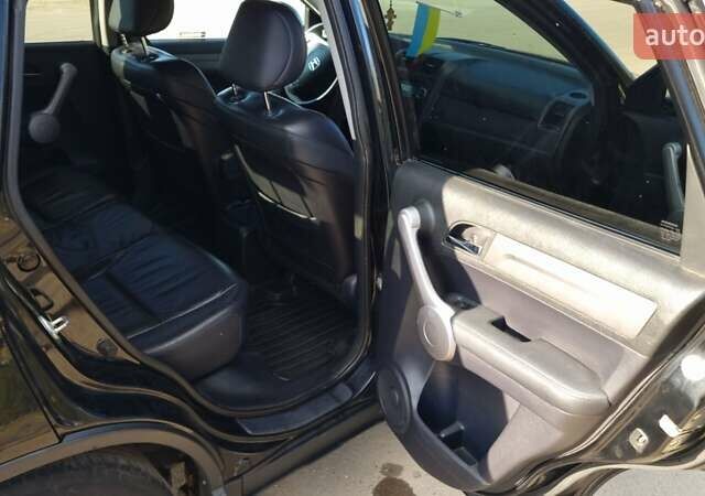 Черный Хонда СРВ, объемом двигателя 2.2 л и пробегом 310 тыс. км за 10950 $, фото 9 на Automoto.ua