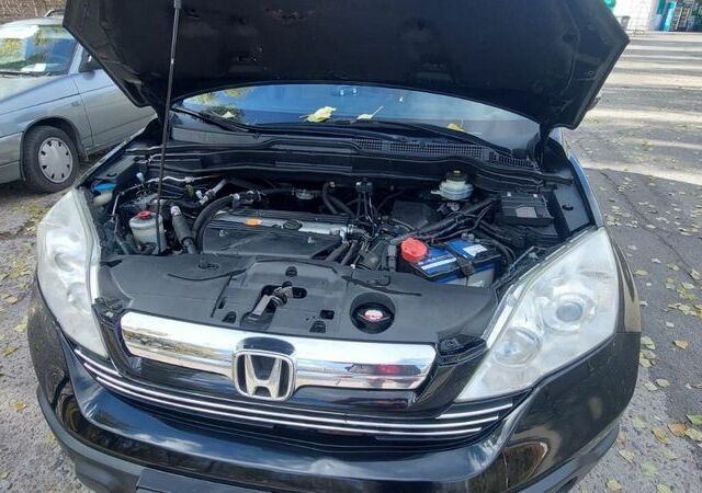 Черный Хонда СРВ, объемом двигателя 2.4 л и пробегом 240 тыс. км за 8900 $, фото 6 на Automoto.ua