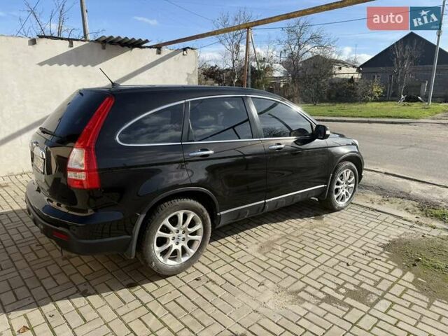 Черный Хонда СРВ, объемом двигателя 2.35 л и пробегом 258 тыс. км за 13500 $, фото 2 на Automoto.ua