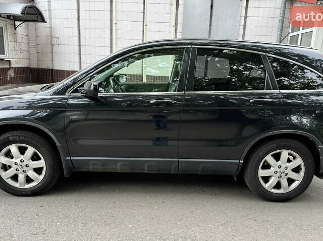 Черный Хонда СРВ, объемом двигателя 2.35 л и пробегом 124 тыс. км за 13500 $, фото 2 на Automoto.ua