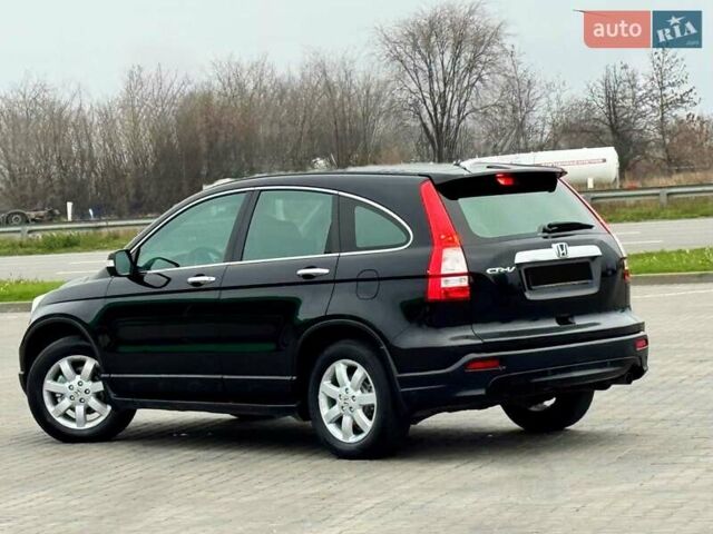 Черный Хонда СРВ, объемом двигателя 2.4 л и пробегом 164 тыс. км за 10999 $, фото 1 на Automoto.ua