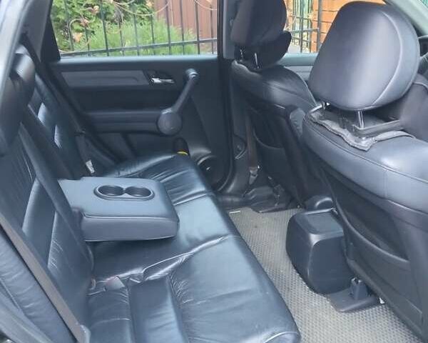 Черный Хонда СРВ, объемом двигателя 2.4 л и пробегом 190 тыс. км за 10500 $, фото 1 на Automoto.ua