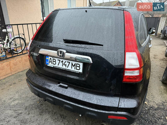 Черный Хонда СРВ, объемом двигателя 2.35 л и пробегом 141 тыс. км за 13000 $, фото 8 на Automoto.ua