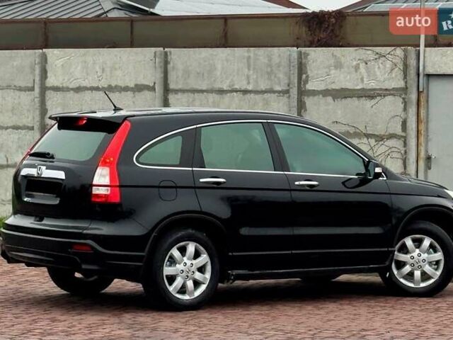 Чорний Хонда СРВ, об'ємом двигуна 2.4 л та пробігом 164 тис. км за 10900 $, фото 1 на Automoto.ua