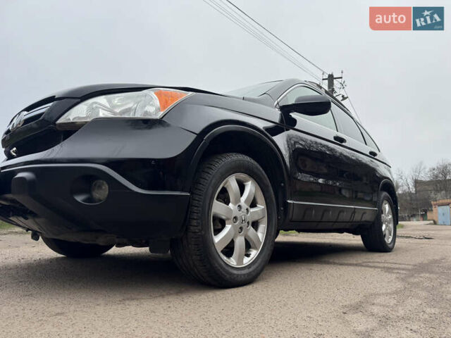 Черный Хонда СРВ, объемом двигателя 2.35 л и пробегом 240 тыс. км за 6900 $, фото 51 на Automoto.ua