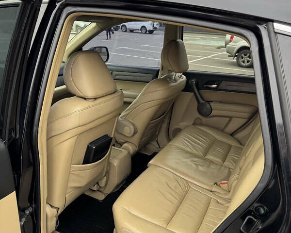 Черный Хонда СРВ, объемом двигателя 2.4 л и пробегом 312 тыс. км за 10000 $, фото 5 на Automoto.ua