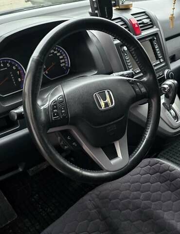 Чорний Хонда СРВ, об'ємом двигуна 2 л та пробігом 234 тис. км за 11299 $, фото 4 на Automoto.ua