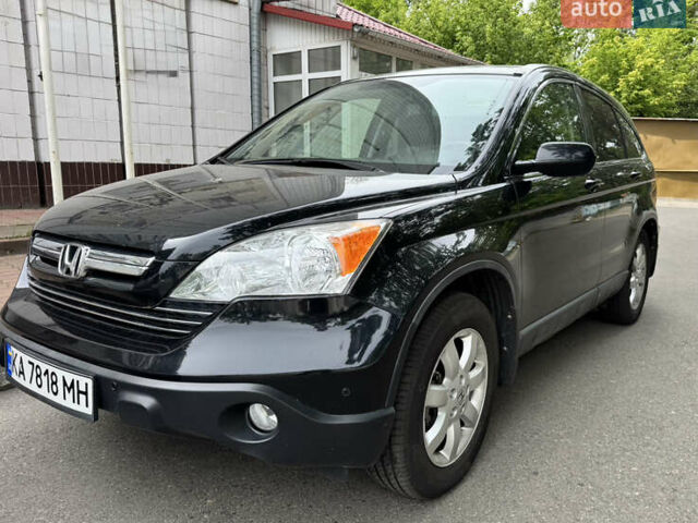 Черный Хонда СРВ, объемом двигателя 2.35 л и пробегом 124 тыс. км за 13500 $, фото 1 на Automoto.ua