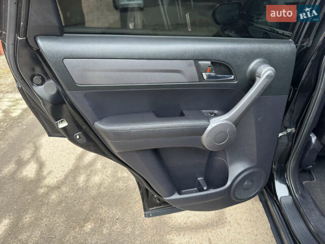 Черный Хонда СРВ, объемом двигателя 2.35 л и пробегом 240 тыс. км за 6900 $, фото 36 на Automoto.ua