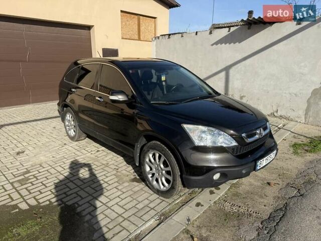 Черный Хонда СРВ, объемом двигателя 2.35 л и пробегом 258 тыс. км за 13500 $, фото 1 на Automoto.ua