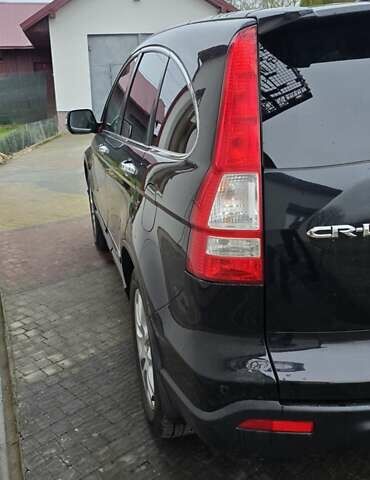 Чорний Хонда СРВ, об'ємом двигуна 2 л та пробігом 234 тис. км за 11299 $, фото 3 на Automoto.ua