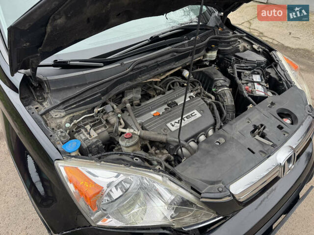 Черный Хонда СРВ, объемом двигателя 2.35 л и пробегом 240 тыс. км за 6900 $, фото 47 на Automoto.ua