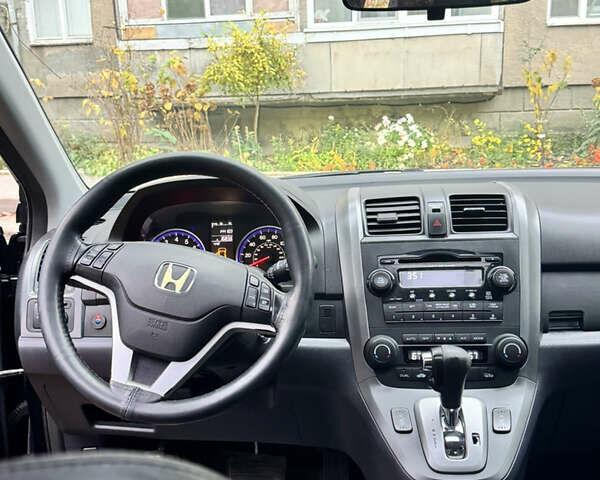 Черный Хонда СРВ, объемом двигателя 2.4 л и пробегом 223 тыс. км за 10800 $, фото 23 на Automoto.ua