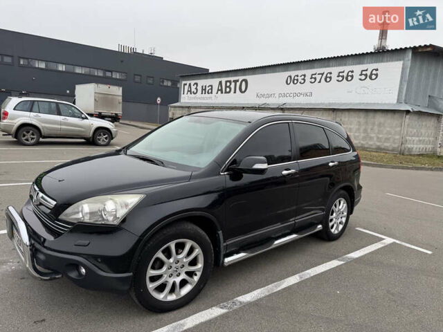 Черный Хонда СРВ, объемом двигателя 2.4 л и пробегом 312 тыс. км за 10000 $, фото 1 на Automoto.ua