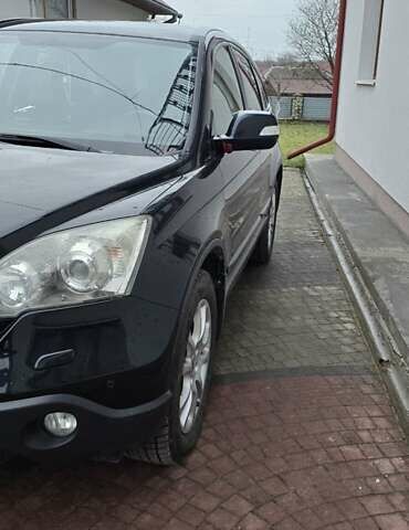 Чорний Хонда СРВ, об'ємом двигуна 2 л та пробігом 234 тис. км за 11299 $, фото 6 на Automoto.ua