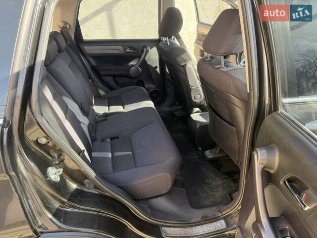 Черный Хонда СРВ, объемом двигателя 2.35 л и пробегом 258 тыс. км за 13500 $, фото 8 на Automoto.ua