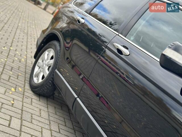 Черный Хонда СРВ, объемом двигателя 2 л и пробегом 185 тыс. км за 10750 $, фото 74 на Automoto.ua