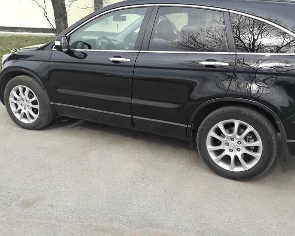 Чорний Хонда СРВ, об'ємом двигуна 2.4 л та пробігом 265 тис. км за 12200 $, фото 1 на Automoto.ua