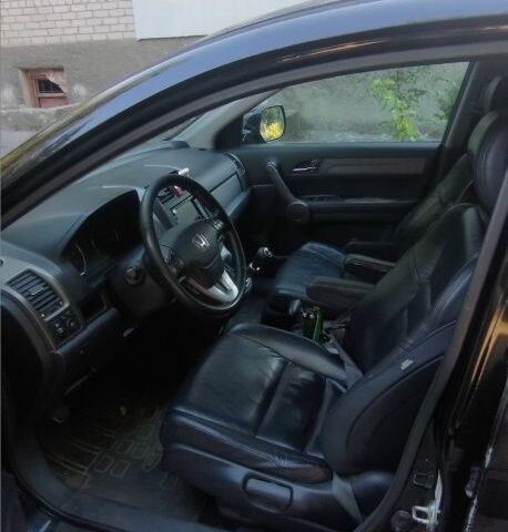 Черный Хонда СРВ, объемом двигателя 2.2 л и пробегом 142 тыс. км за 6999 $, фото 2 на Automoto.ua