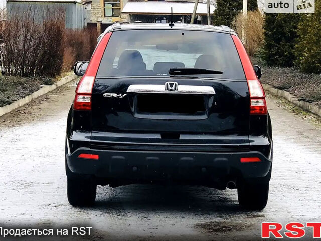 Черный Хонда СРВ, объемом двигателя 2.4 л и пробегом 131 тыс. км за 11000 $, фото 5 на Automoto.ua