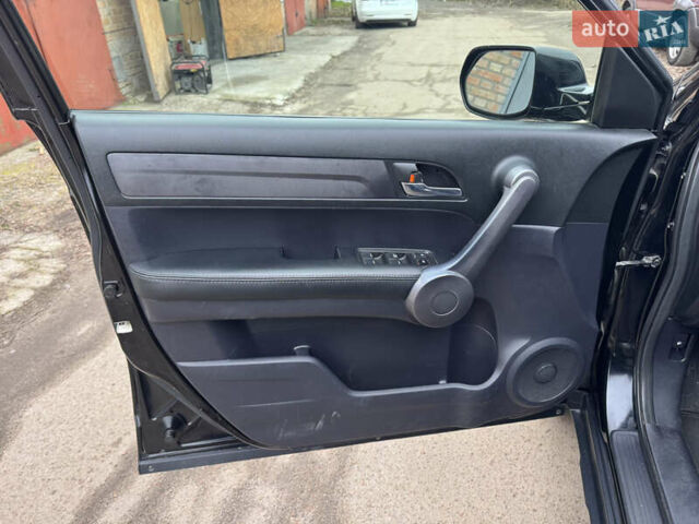 Черный Хонда СРВ, объемом двигателя 2.35 л и пробегом 240 тыс. км за 6900 $, фото 32 на Automoto.ua