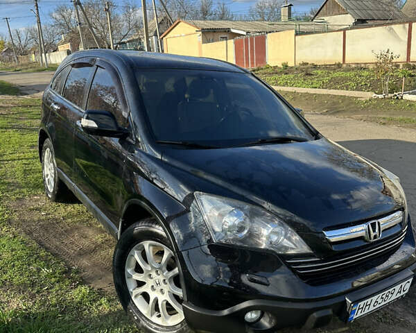 Черный Хонда СРВ, объемом двигателя 2.4 л и пробегом 133 тыс. км за 9499 $, фото 1 на Automoto.ua