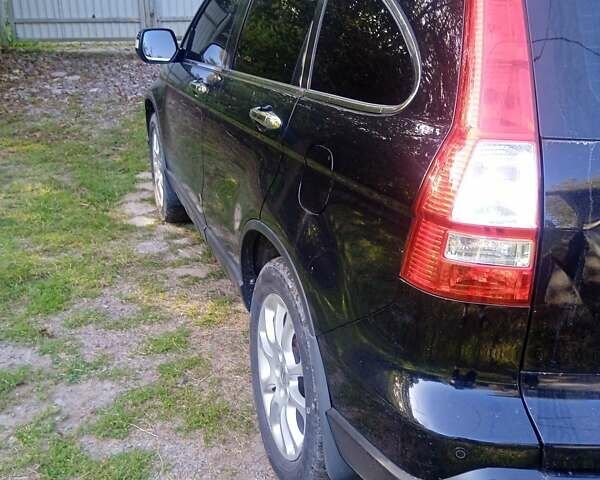 Черный Хонда СРВ, объемом двигателя 2.35 л и пробегом 145 тыс. км за 10300 $, фото 21 на Automoto.ua