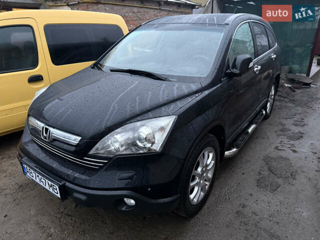 Черный Хонда СРВ, объемом двигателя 2.35 л и пробегом 141 тыс. км за 13000 $, фото 1 на Automoto.ua