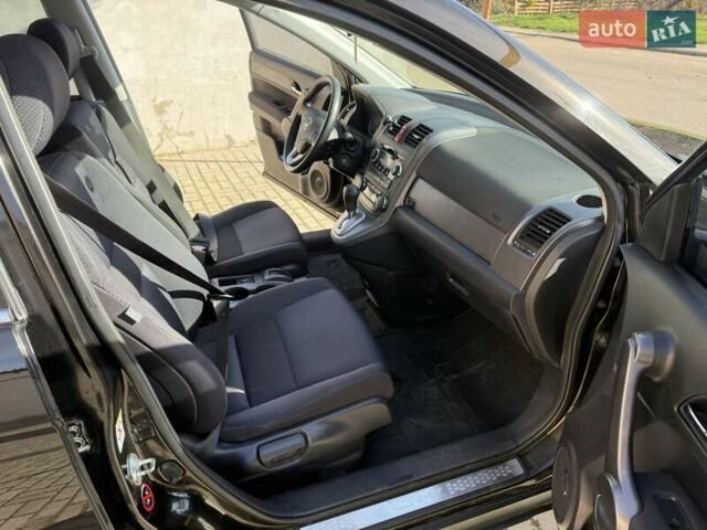 Черный Хонда СРВ, объемом двигателя 2.35 л и пробегом 258 тыс. км за 13500 $, фото 9 на Automoto.ua