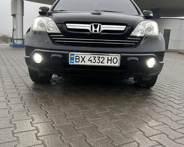 Черный Хонда СРВ, объемом двигателя 2.35 л и пробегом 230 тыс. км за 10400 $, фото 1 на Automoto.ua