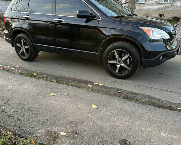 Черный Хонда СРВ, объемом двигателя 2.4 л и пробегом 180 тыс. км за 10500 $, фото 4 на Automoto.ua