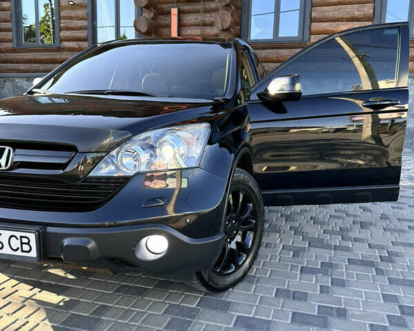 Чорний Хонда СРВ, об'ємом двигуна 2.4 л та пробігом 230 тис. км за 12900 $, фото 1 на Automoto.ua