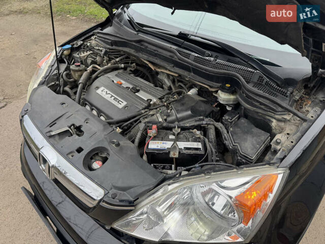 Черный Хонда СРВ, объемом двигателя 2.35 л и пробегом 240 тыс. км за 6900 $, фото 48 на Automoto.ua