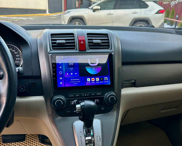 Черный Хонда СРВ, объемом двигателя 2.4 л и пробегом 203 тыс. км за 10400 $, фото 12 на Automoto.ua