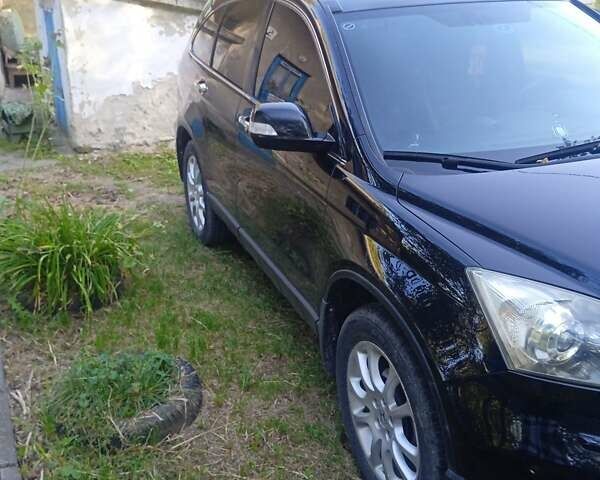 Черный Хонда СРВ, объемом двигателя 2.35 л и пробегом 145 тыс. км за 10300 $, фото 59 на Automoto.ua