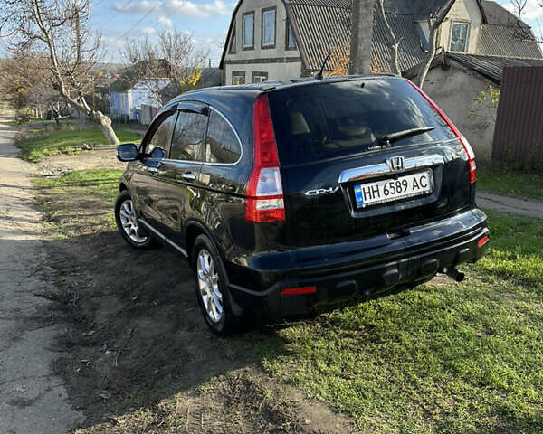 Черный Хонда СРВ, объемом двигателя 2.4 л и пробегом 133 тыс. км за 9499 $, фото 2 на Automoto.ua