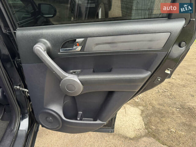 Черный Хонда СРВ, объемом двигателя 2.35 л и пробегом 240 тыс. км за 6900 $, фото 45 на Automoto.ua