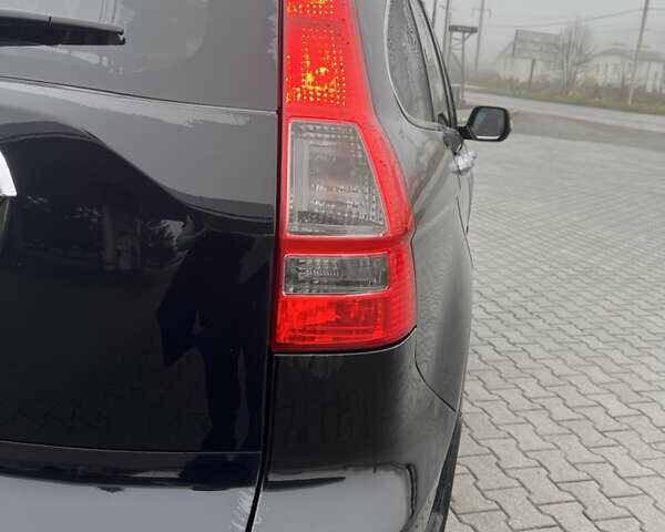 Черный Хонда СРВ, объемом двигателя 2.35 л и пробегом 230 тыс. км за 10400 $, фото 6 на Automoto.ua