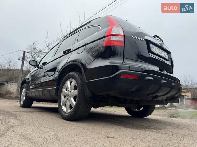 Черный Хонда СРВ, объемом двигателя 2.35 л и пробегом 240 тыс. км за 6900 $, фото 60 на Automoto.ua