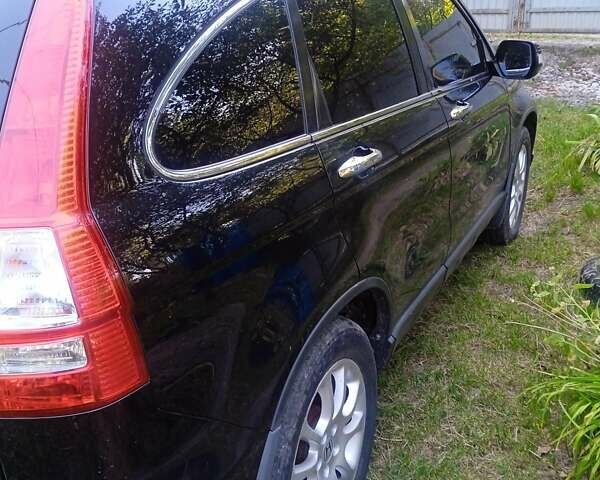 Черный Хонда СРВ, объемом двигателя 2.35 л и пробегом 145 тыс. км за 10500 $, фото 24 на Automoto.ua