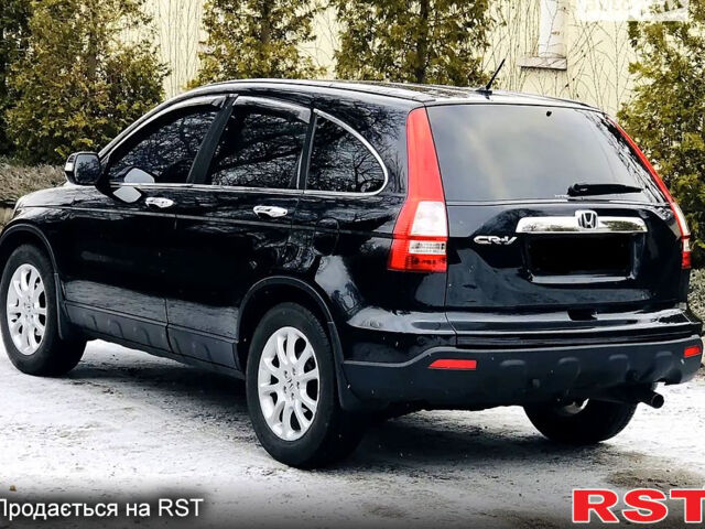 Черный Хонда СРВ, объемом двигателя 2.4 л и пробегом 131 тыс. км за 11000 $, фото 4 на Automoto.ua