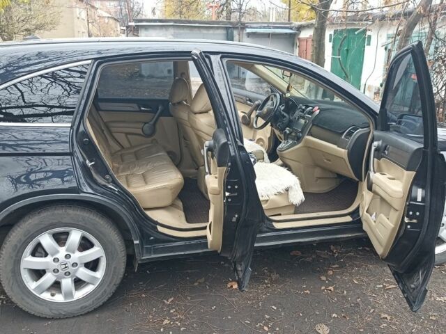 Черный Хонда СРВ, объемом двигателя 2.4 л и пробегом 197 тыс. км за 12000 $, фото 4 на Automoto.ua