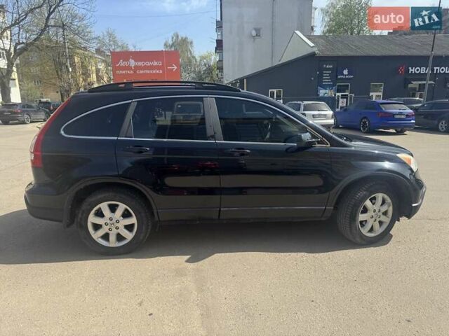 Чорний Хонда СРВ, об'ємом двигуна 2.35 л та пробігом 242 тис. км за 9000 $, фото 5 на Automoto.ua