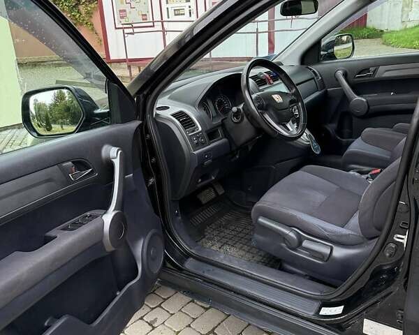 Черный Хонда СРВ, объемом двигателя 2 л и пробегом 202 тыс. км за 12500 $, фото 5 на Automoto.ua