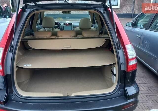 Черный Хонда СРВ, объемом двигателя 2 л и пробегом 157 тыс. км за 13500 $, фото 2 на Automoto.ua