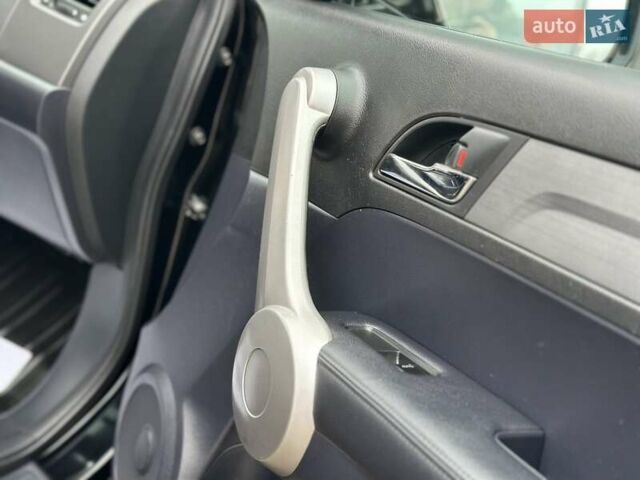 Чорний Хонда СРВ, об'ємом двигуна 2 л та пробігом 185 тис. км за 10150 $, фото 73 на Automoto.ua