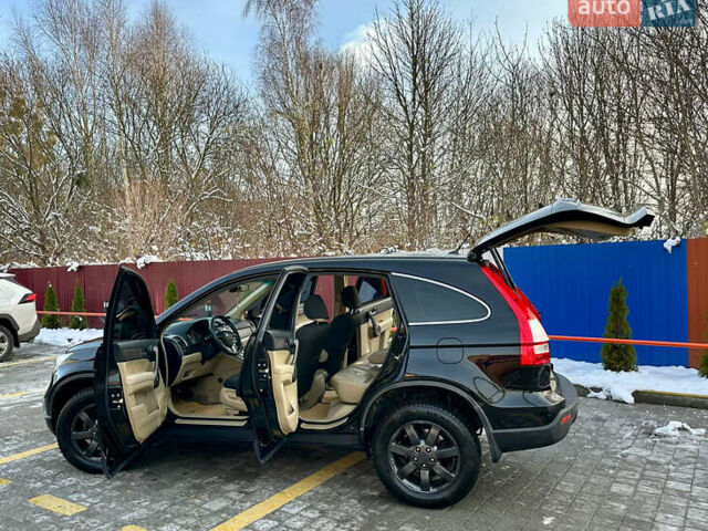 Черный Хонда СРВ, объемом двигателя 2.4 л и пробегом 203 тыс. км за 10400 $, фото 3 на Automoto.ua