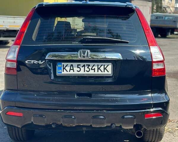 Черный Хонда СРВ, объемом двигателя 2.35 л и пробегом 209 тыс. км за 11300 $, фото 11 на Automoto.ua