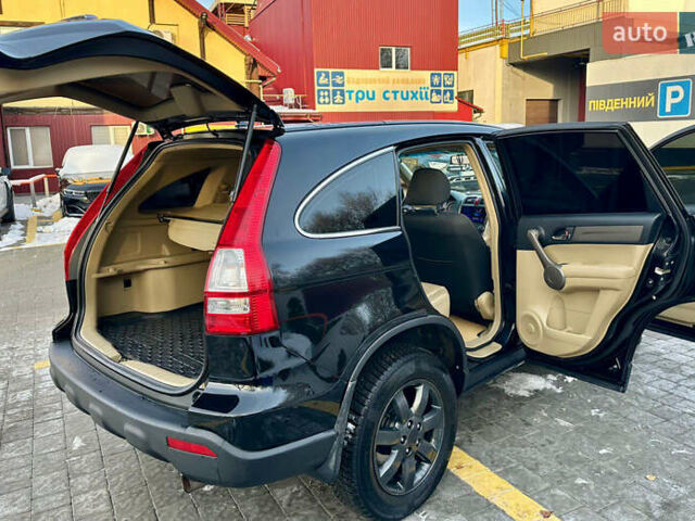 Черный Хонда СРВ, объемом двигателя 2.4 л и пробегом 203 тыс. км за 10400 $, фото 1 на Automoto.ua